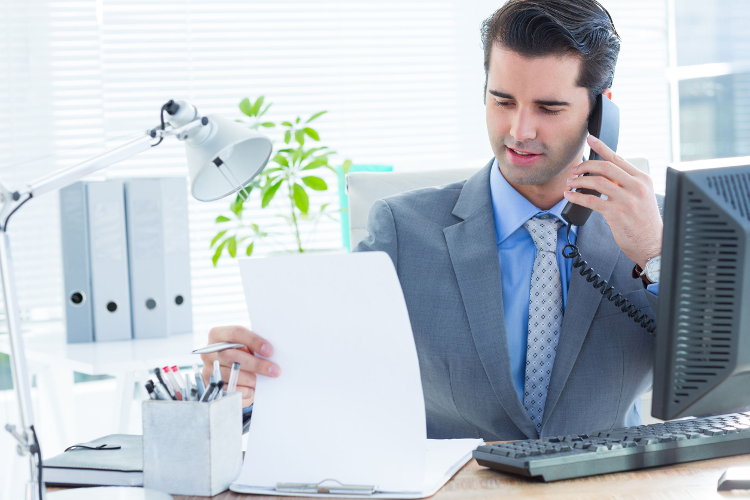 Employer talking on phone