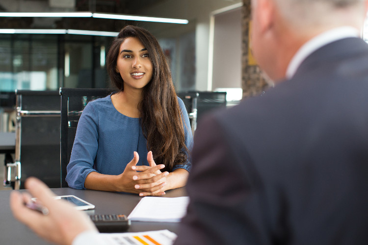 Candidate in job interview listens to the employer