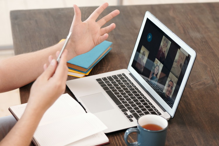 Employee working from home on video call